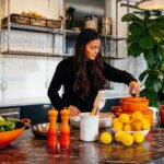 Image of a women preparing food featured on the article - A Comprehensive Guide to 11 Types of Diets - healthy and better living