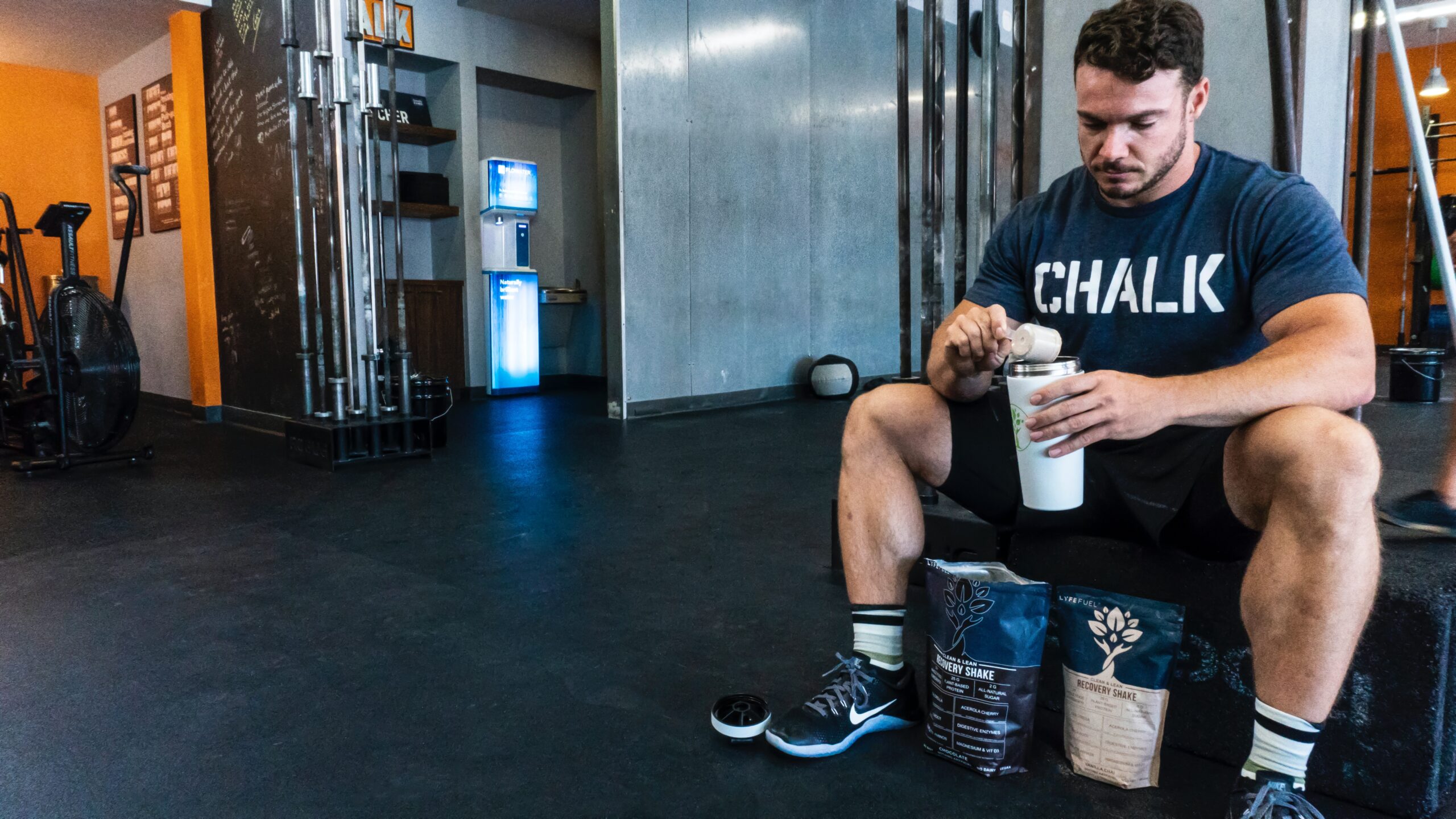 A man preparing protein shake befor a workout featured image for the Protein Intake 101: Your Ultimate Guide for Muscle Building and Weight Loss - Healthy and Better Living