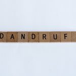 Dandruff written on blocks featured on Big Dandruff Flakes published on healthy n better living